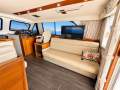 Caribbean 49 Flybridge Cruiser:POP up TV