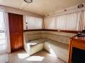 Riviera 40 Aft Cabin " GENUINE LOW ENGINE HOURS ":Port Lounge with Rear cabin door closed