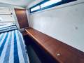 Riviera 40 Aft Cabin " GENUINE LOW ENGINE HOURS ":Aft Cabin Port side storage