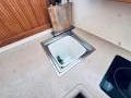 Riviera 40 Aft Cabin " GENUINE LOW ENGINE HOURS ":Galley counter sunk bin