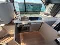 Beneteau Antares 11 OB:Micro, fridge, induction top