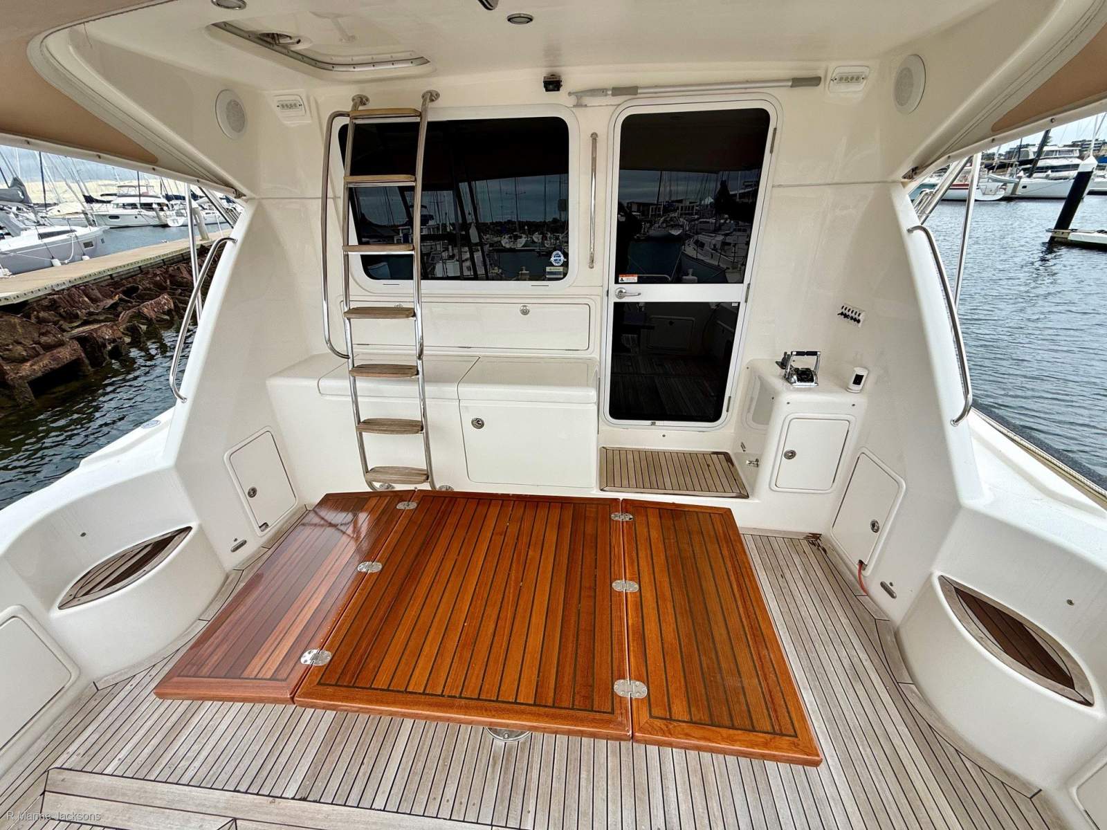  Riviera 47 Enclosed Flybridge Boat Brokers of Tasmania