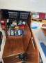 Van De Stadt Spirit 28:Port side rear, electrical, storage, vhf and plotter with red cover on it