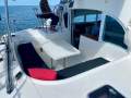 Lagoon 380 Spacious Living-All-Weather Cockpit-Major Upgrades:Large entertainers cockpit with double helm seat