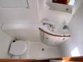 Lagoon 380 Spacious Living-All-Weather Cockpit-Major Upgrades:Port head with electric fresh water flush 