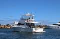 Caribbean 40 Flybridge Cruiser With Digital Controls And Bow Thruster