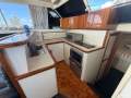 Caribbean 40 Flybridge Cruiser With Digital Controls And Bow Thruster