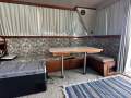 Randell 41 Mk II Flybridge Sports Fisher " DUAL HELM, DUAL SHAFT DIESELS ":Starboard side dinning table and lounge