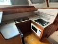 Randell 41 Mk II Flybridge Sports Fisher " DUAL HELM, DUAL SHAFT DIESELS ":Ports side galley