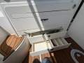 Boston Whaler 315 Conquest Pilothouse:Drawers under BBQ