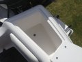 Caribbean Reef Runner:Rear lockers / Livewell plumbing optional