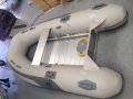 Quicksilver 310 Inflatable:Low stored oars and ALUM seat