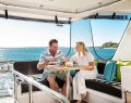 Riviera 52 Enclosed Flybridge:Flybridge Rear Lounge
