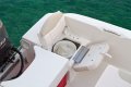 Robalo R160:Flip up seats with storage